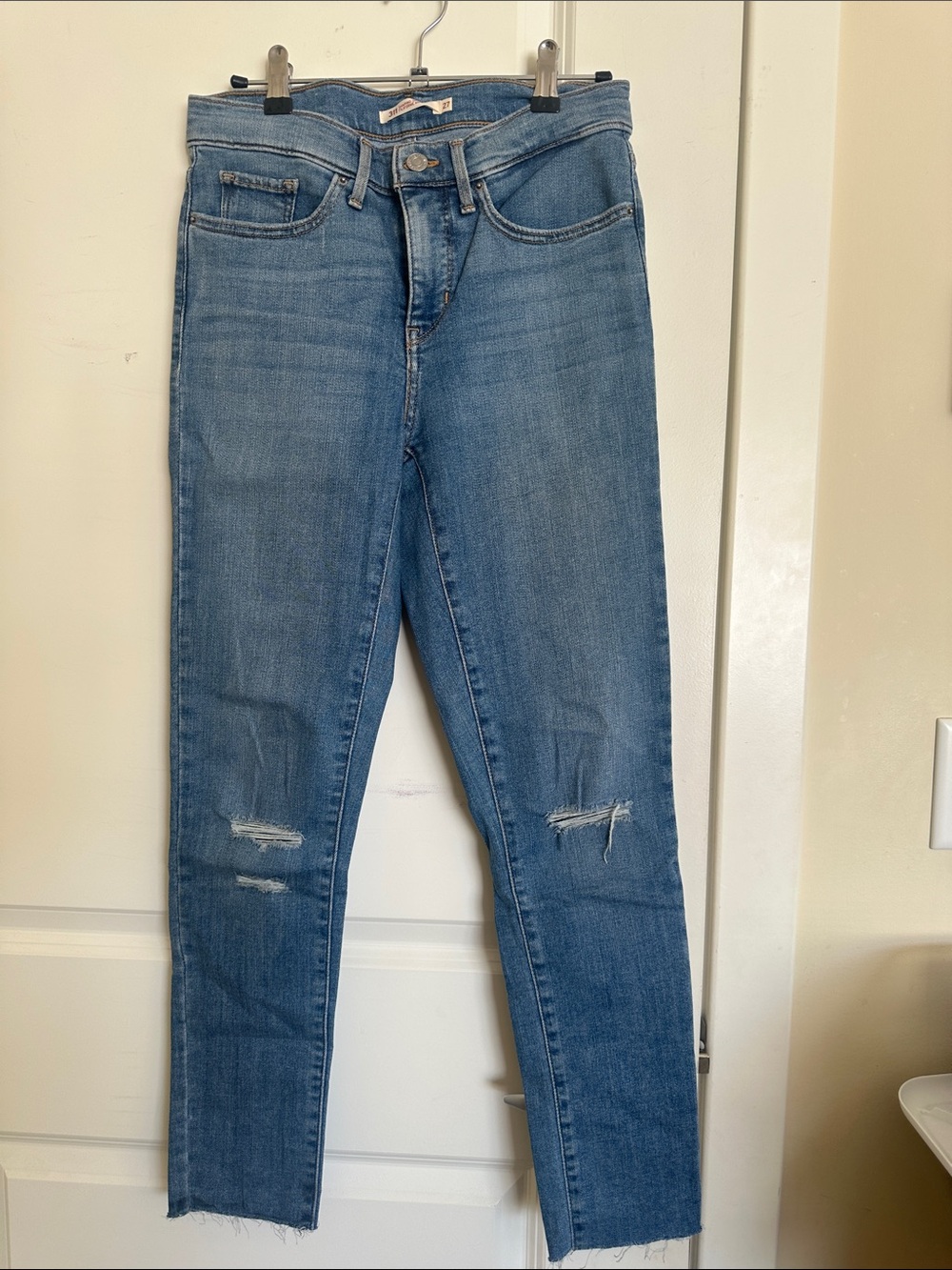 Levi's Light Blue Skinny Jeans with Knee Distressing